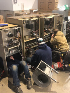 Faszold repair techs training on furnaces for repair